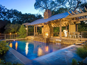 "outdoor living pool at night"