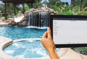 tablet being used outdoors pool