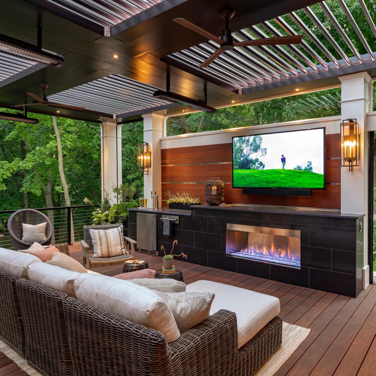 outdoor seating on deck with tv and fireplace